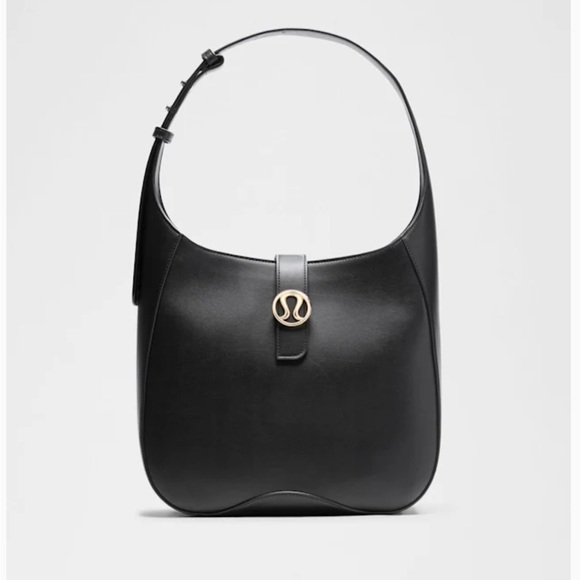 lululemon athletica Handbags - Lululemon Leather Alternative Shoulder Bag Black Gold 8L Dust Bag Pockets NEW